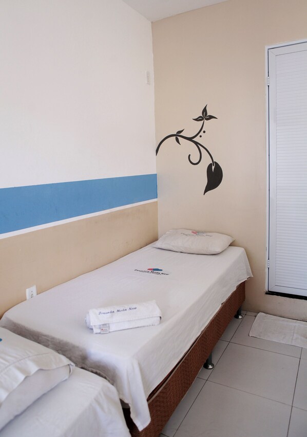Blackout curtains, iron/ironing board, free WiFi, bed sheets