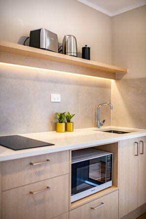 Chambre avec lits jumeaux, coin cuisine | Cuisine privée