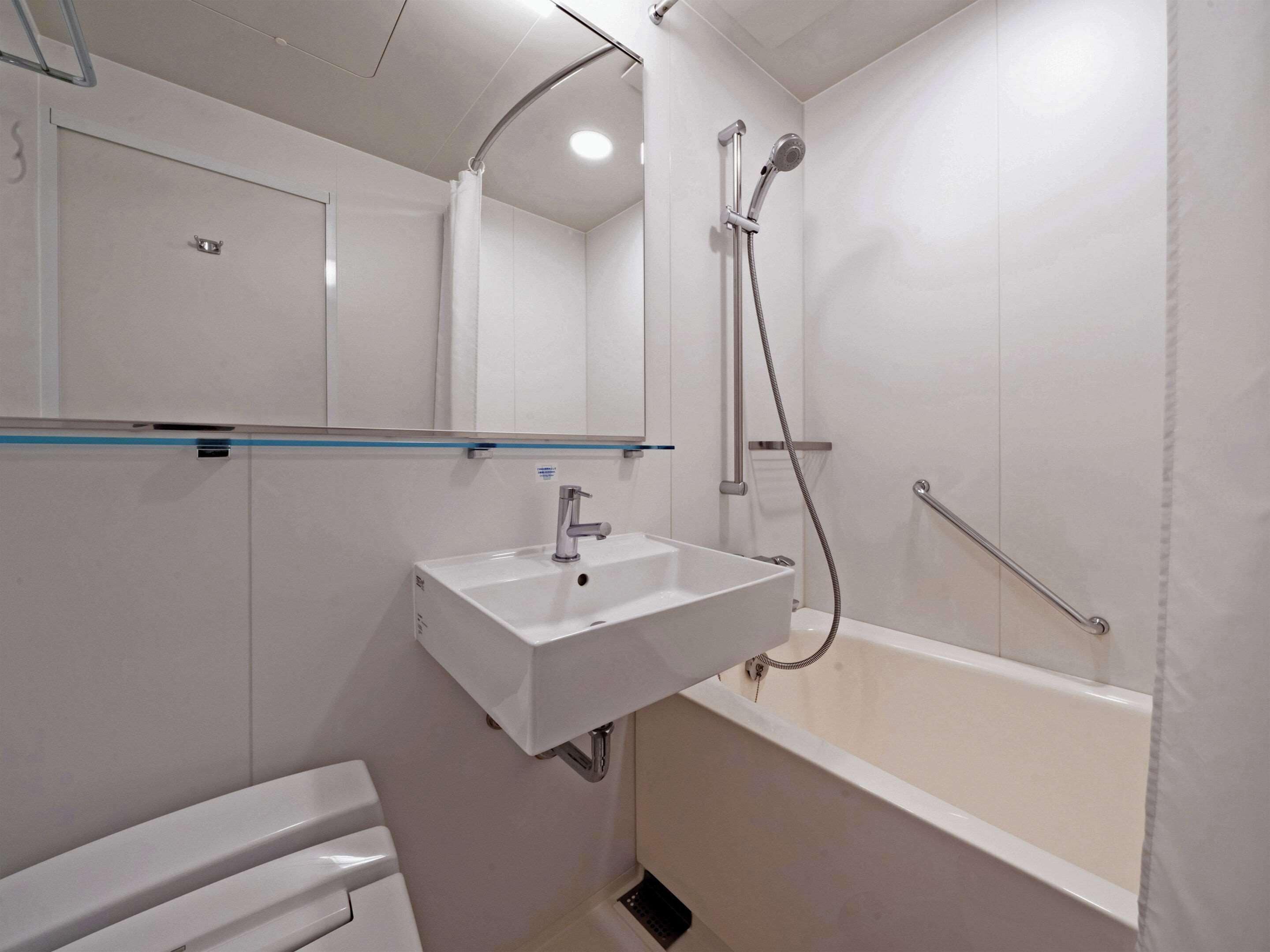 free toiletries, hair dryer, slippers, bidet