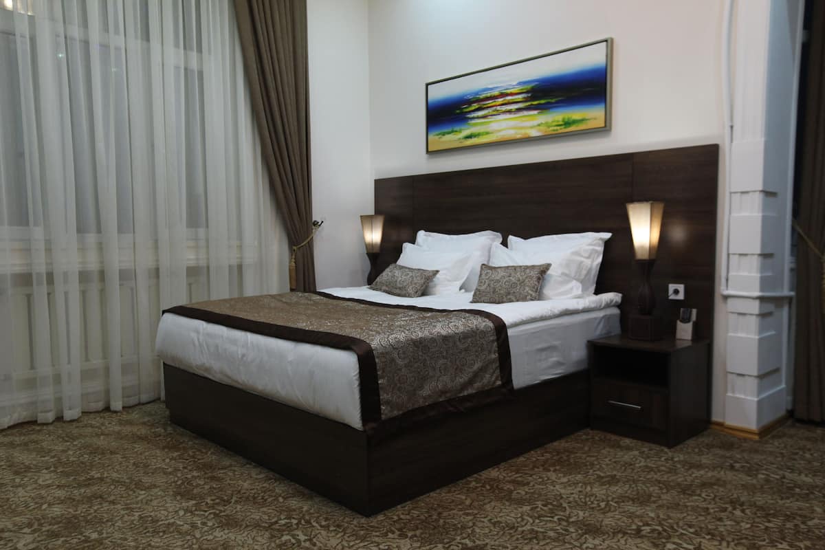 Lotte King Room | Premium bedding, minibar, in-room safe, desk