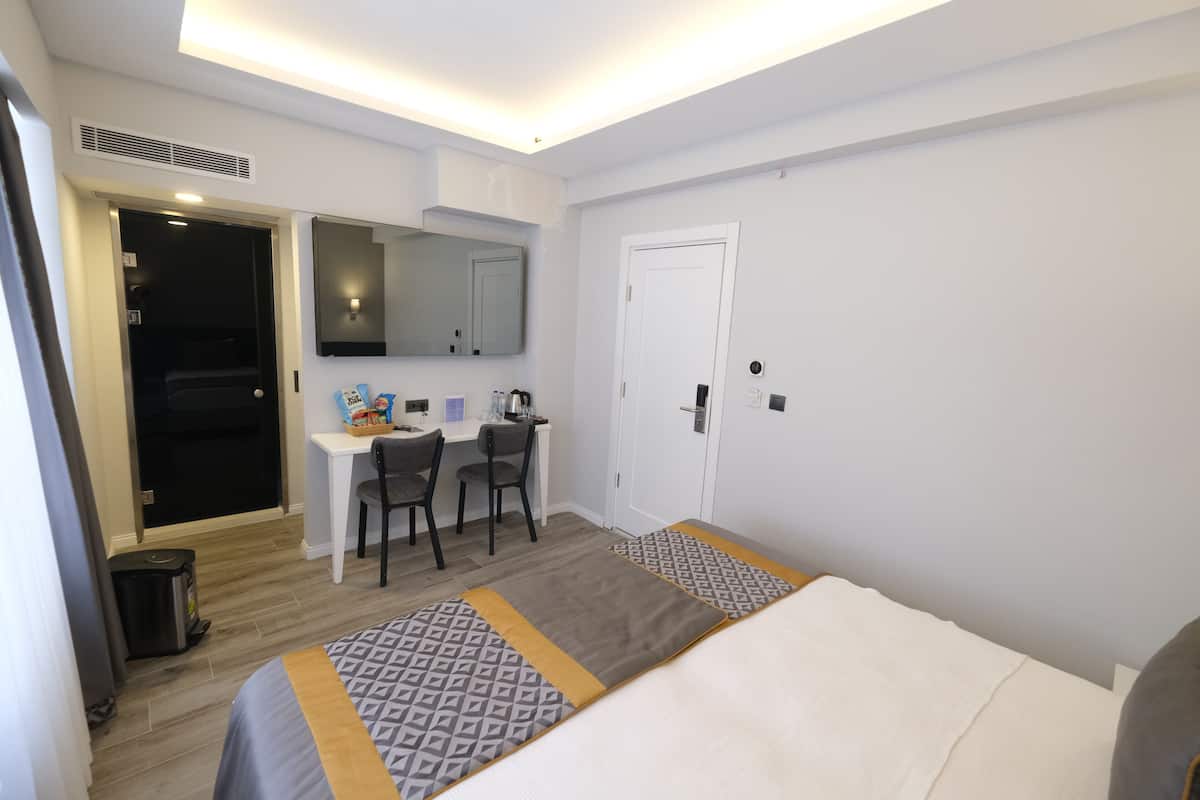 Ropa de cama de alta calidad y cortinas blackout