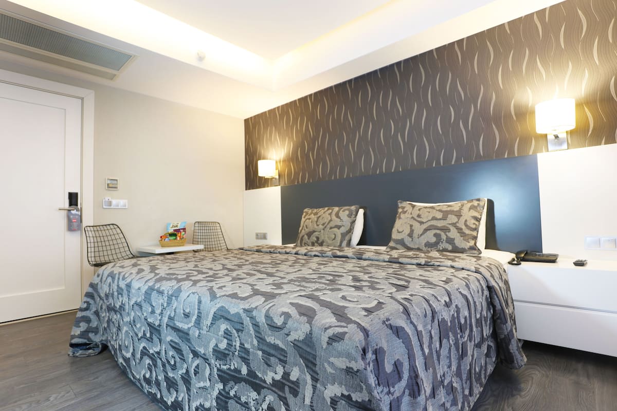 Ropa de cama de alta calidad y cortinas blackout