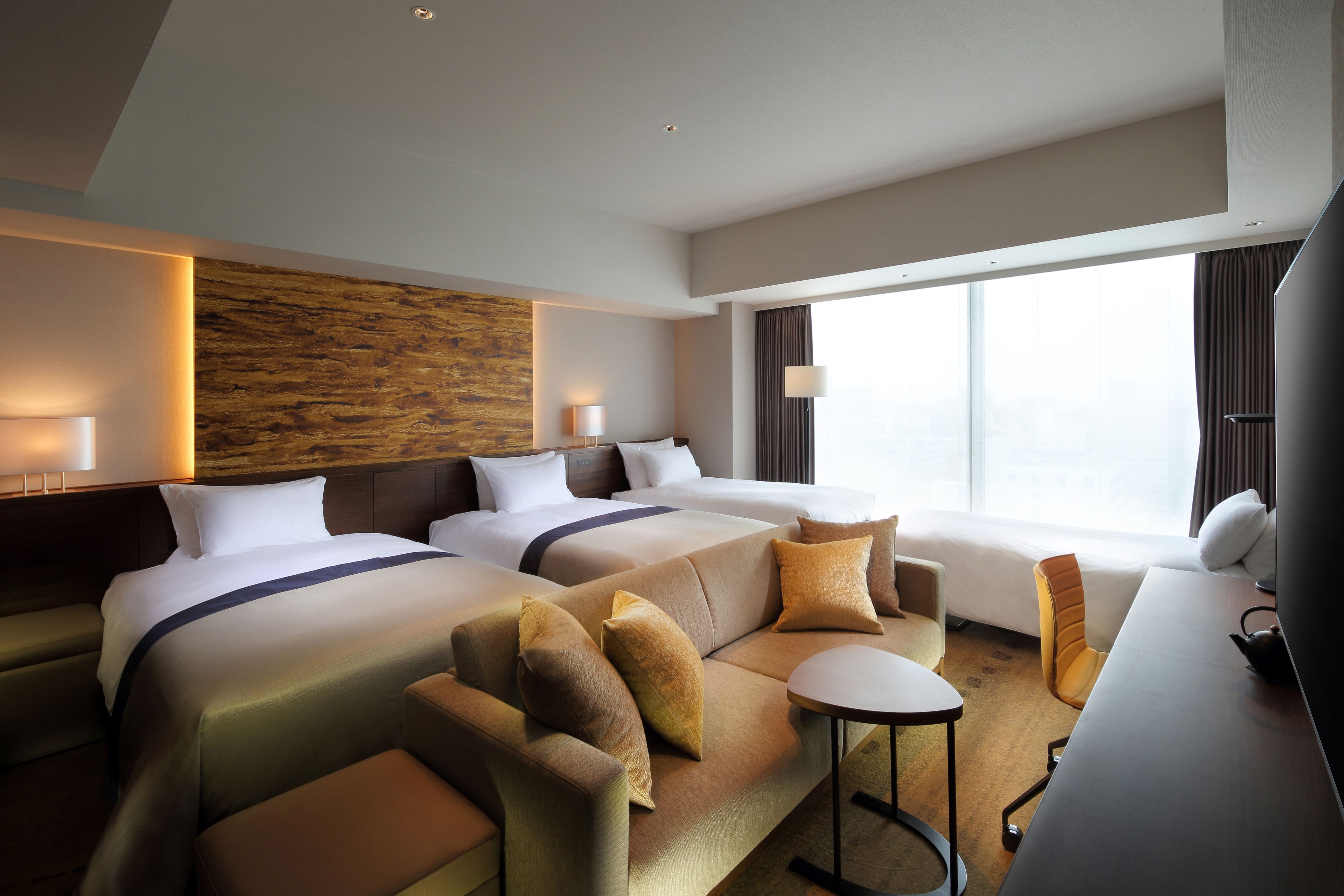 premier quadruple room, 4 people (39sqm), non smoking  | premium bedding, in-room safe, blackout curtains, soundproofing