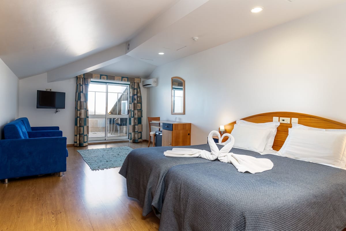 Family Suite, Balcony | 1 bedroom, desk, blackout curtains, soundproofing
