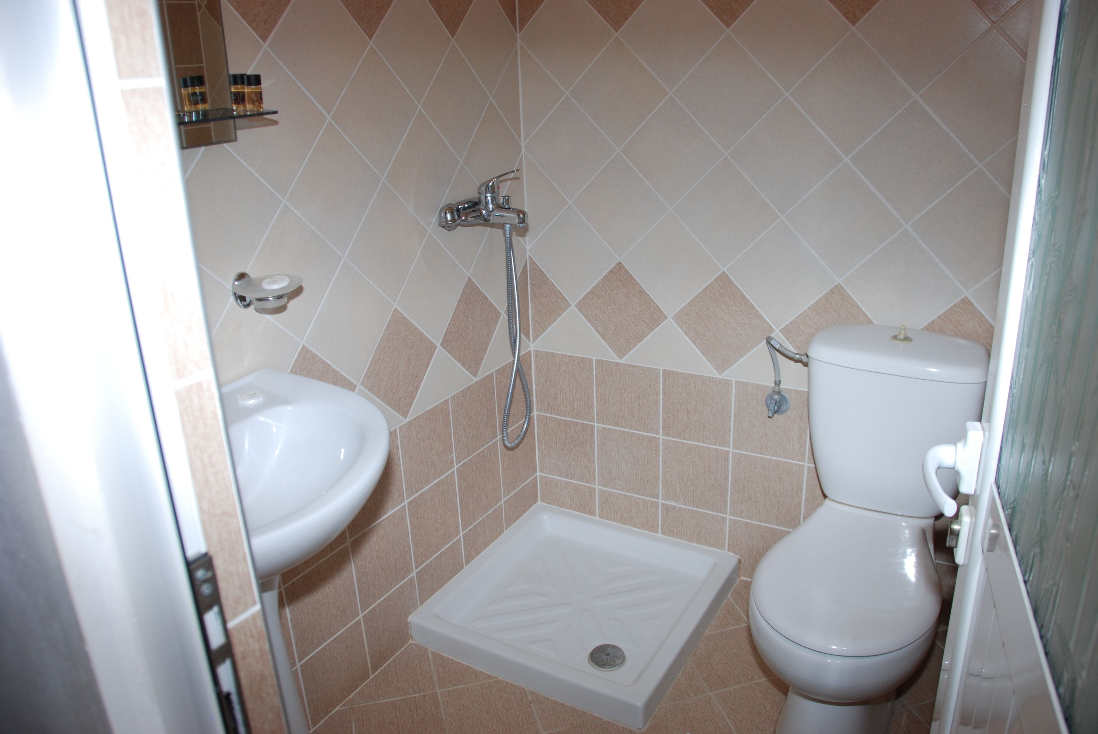 twin room, balcony, sea view | bathroom | shower, free toiletries, hair dryer, bathrobes