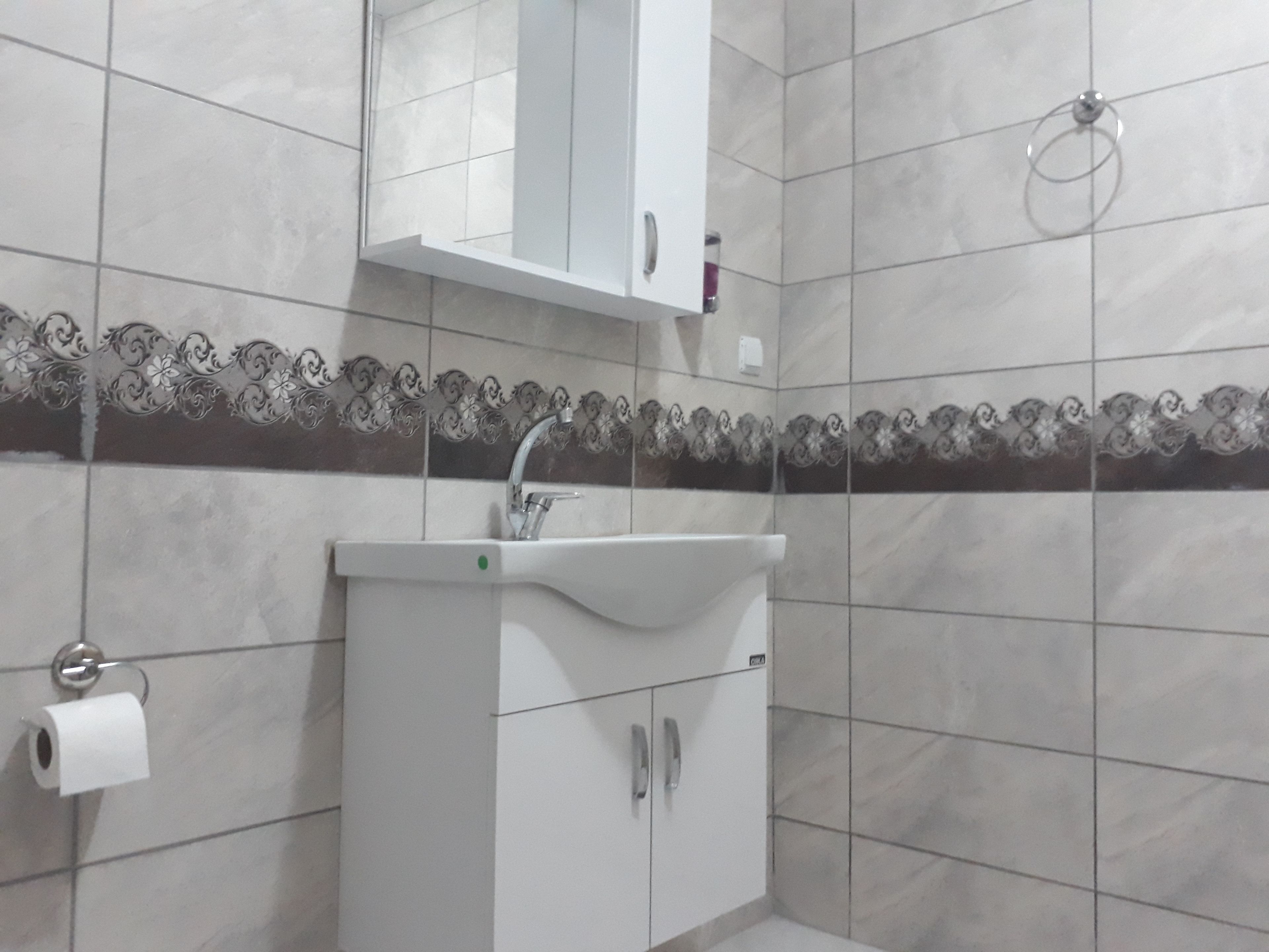 single room | bathroom | shower, hair dryer, slippers, towels