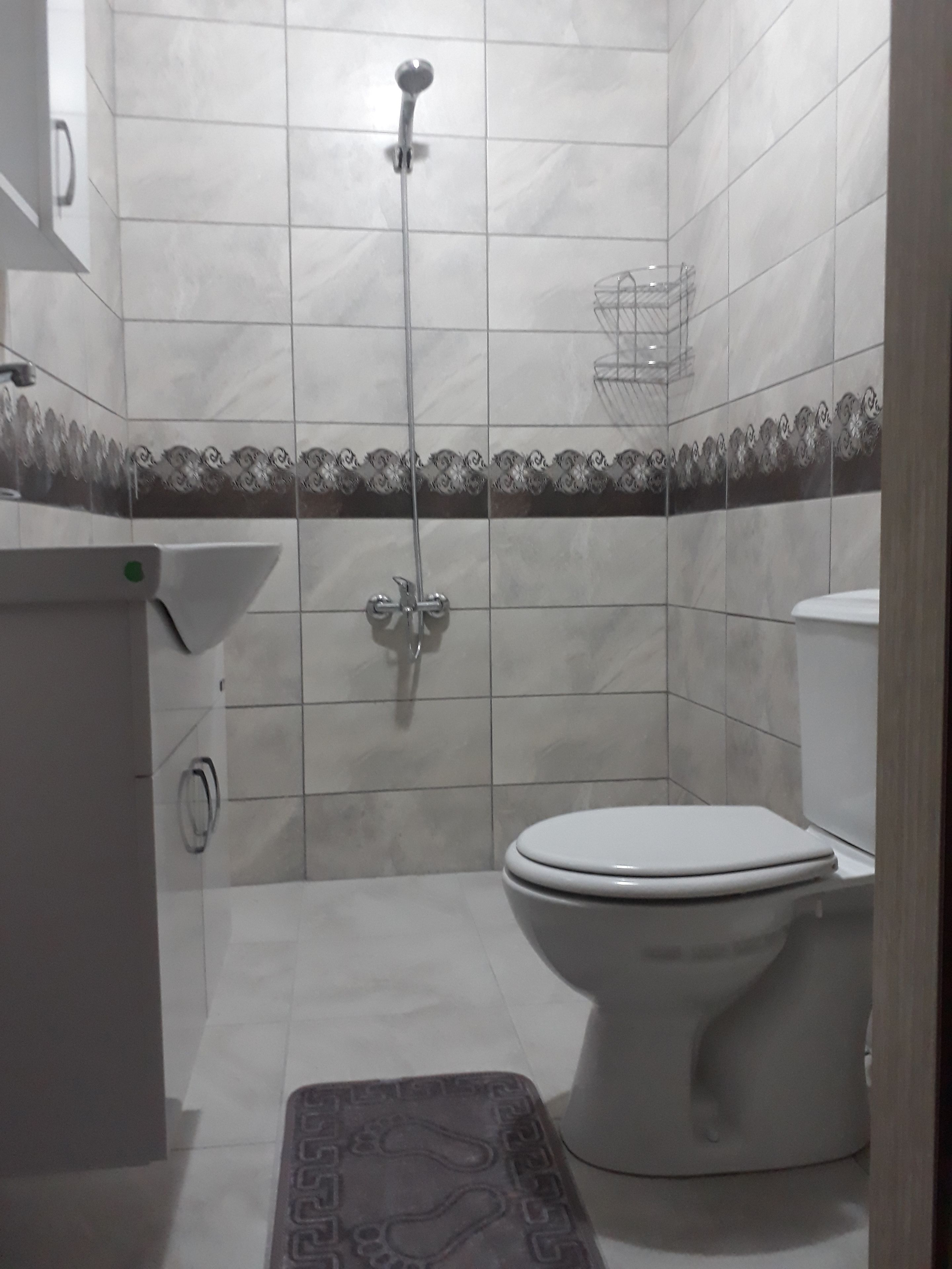 single room | bathroom | shower, hair dryer, slippers, towels