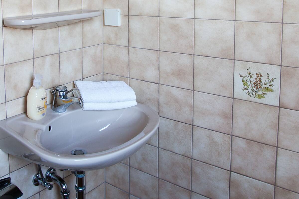 shared dormitory | bathroom | shower, towels