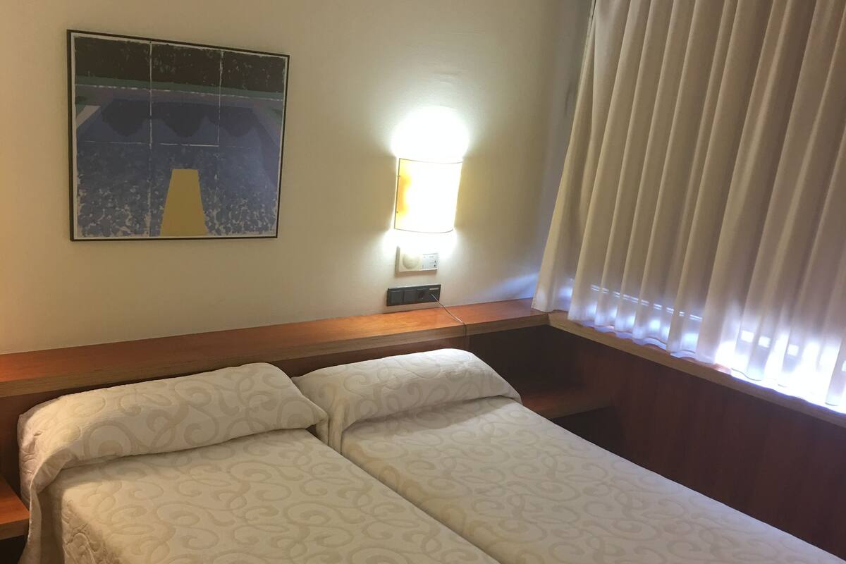 Desk, blackout drapes, iron/ironing board, free WiFi