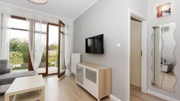 Luxury Apartment, 1 Bedroom, City View | Living area | Flat-screen TV