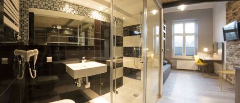 Standard Studio Suite (with mezzanine) | Bathroom | Hair dryer, towels