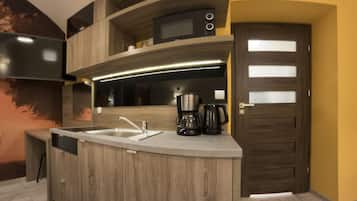 Fridge, microwave, stovetop, coffee/tea maker