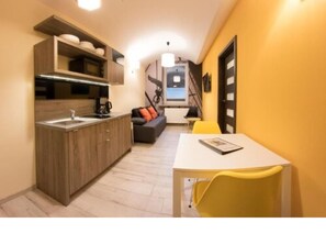 Fridge, microwave, stovetop, coffee/tea maker