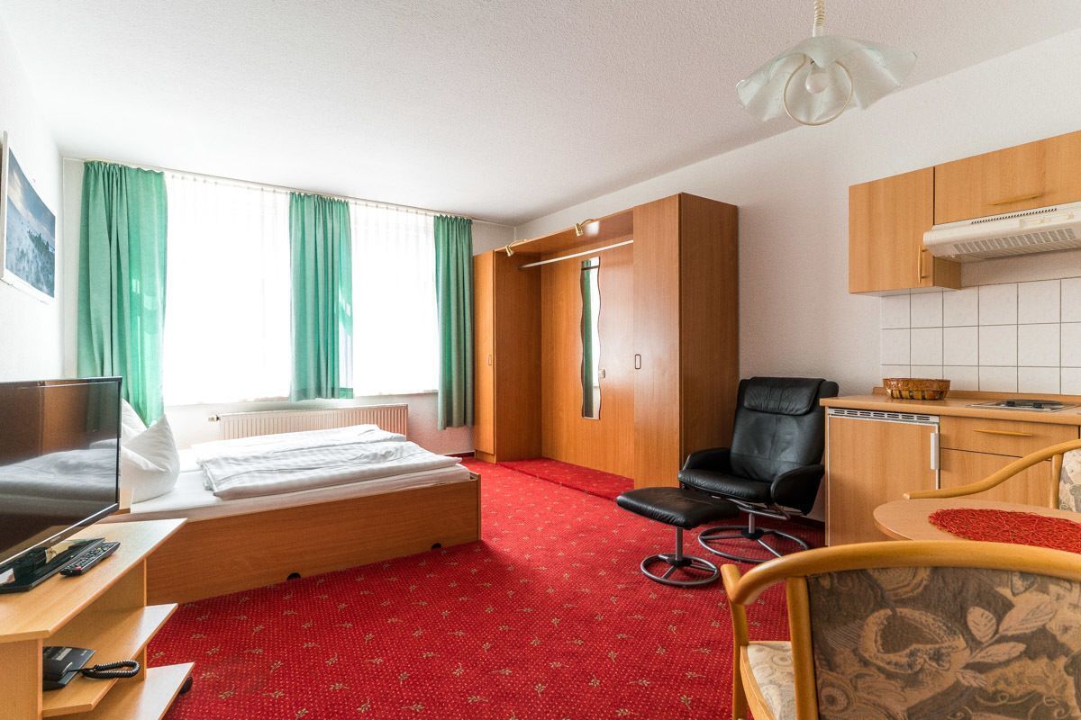 Desk, cribs/infant beds, rollaway beds, free WiFi