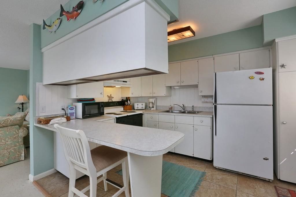 Departamento estándar, 2 habitaciones | Cocina privada | Refrigerador, microondas y cafetera y tetera 