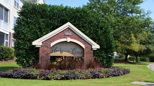 A brick building with a sign reading "Harbour Cove" and the number "2241". - 123 Harbour Cove (North Myrtle Beach)