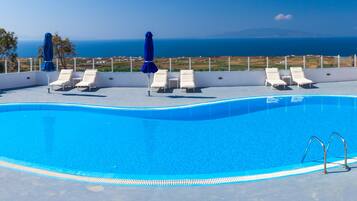 Outdoor pool, open 9:30 AM to 7:00 PM, pool umbrellas, sun loungers