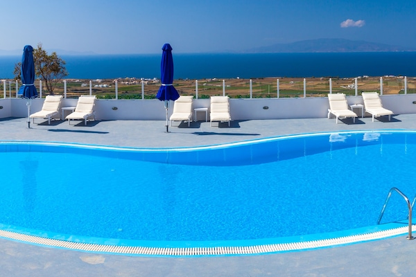 Outdoor pool, open 9:30 AM to 7:00 PM, pool umbrellas, sun loungers