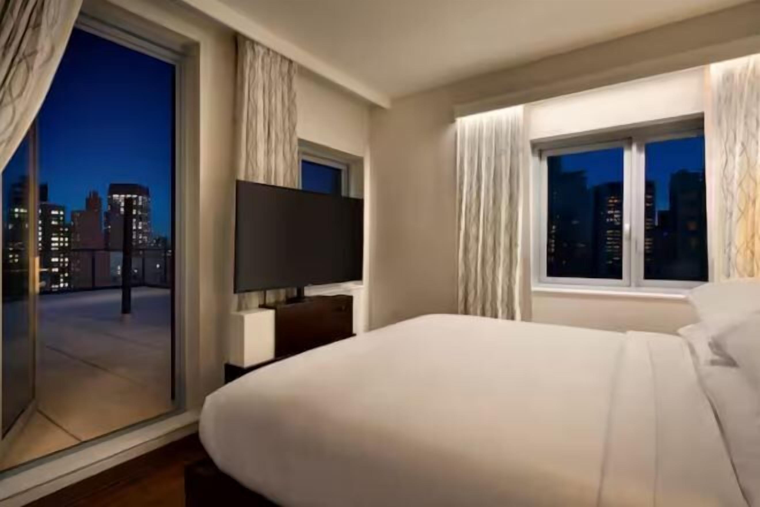 Premium bedding, down comforters, pillowtop beds, in-room safe