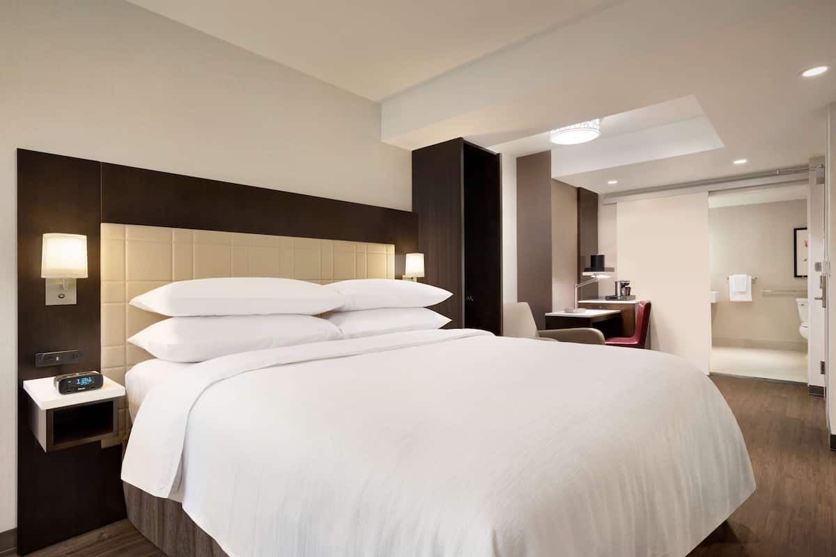 Premium bedding, down comforters, pillowtop beds, in-room safe