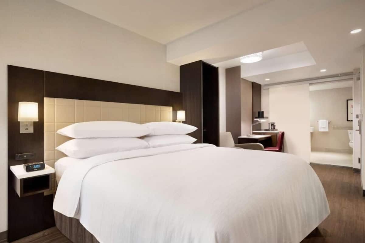 Premium bedding, down comforters, pillowtop beds, in-room safe