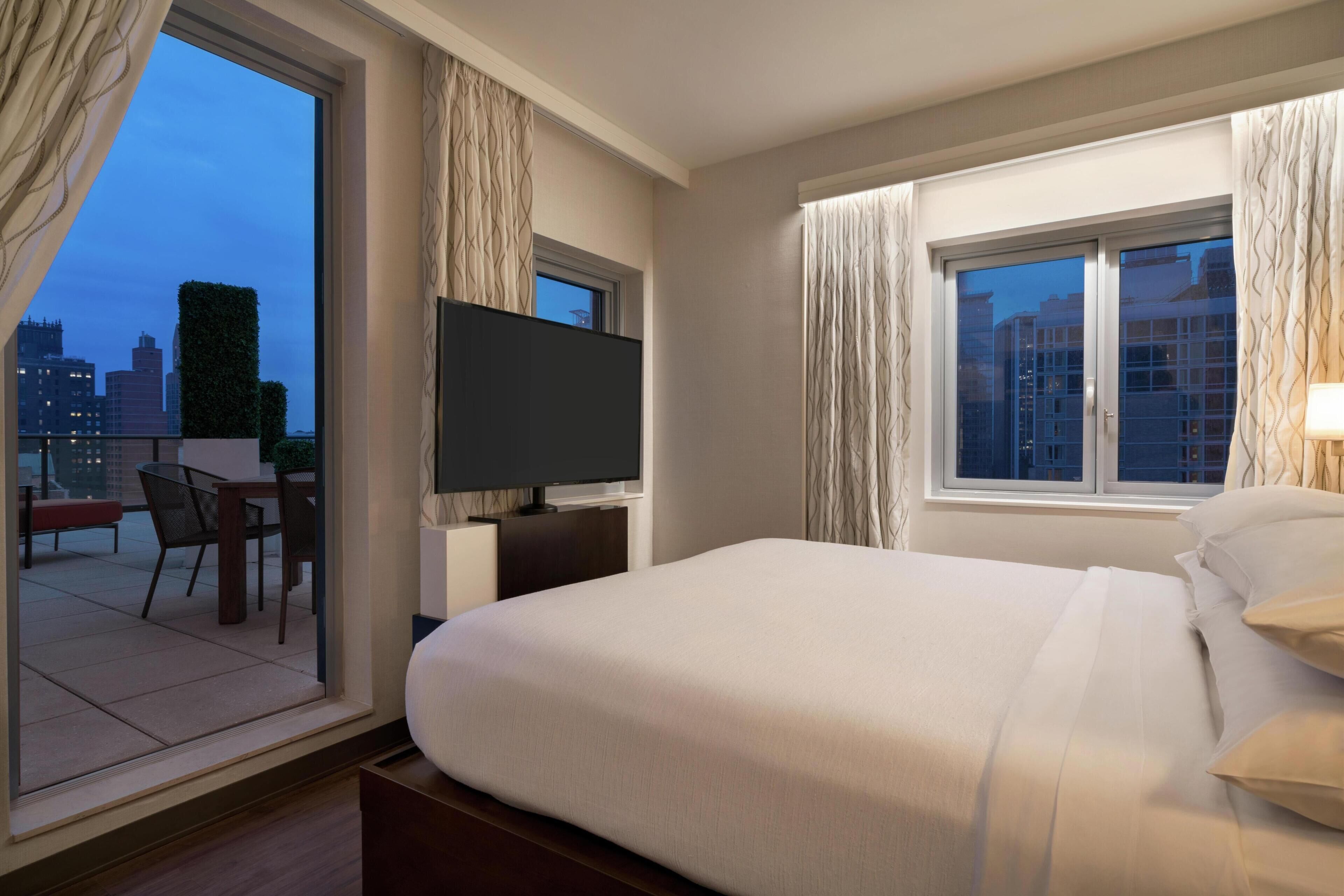 Room, 1 King Bed (Empire Skyview with Terrace) | Premium bedding, down comforters, pillowtop beds, in-room safe