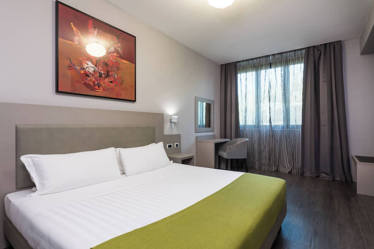 Deluxe-Zimmer, 1 King-Bett | 1 Schlafzimmer, Minibar, individuell dekoriert, individuell eingerichtet