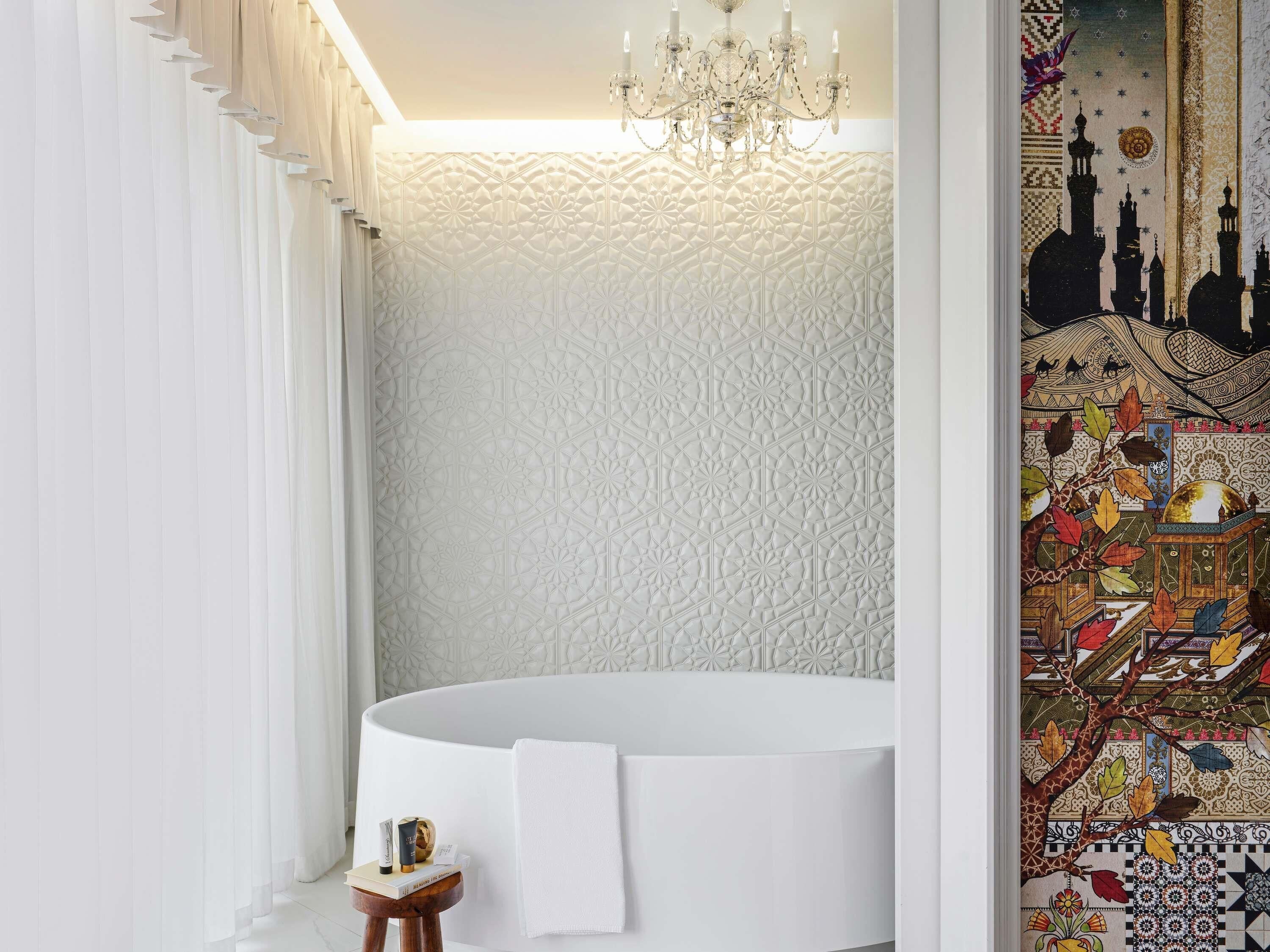 Premium bedding, down comforters, minibar, in-room safe