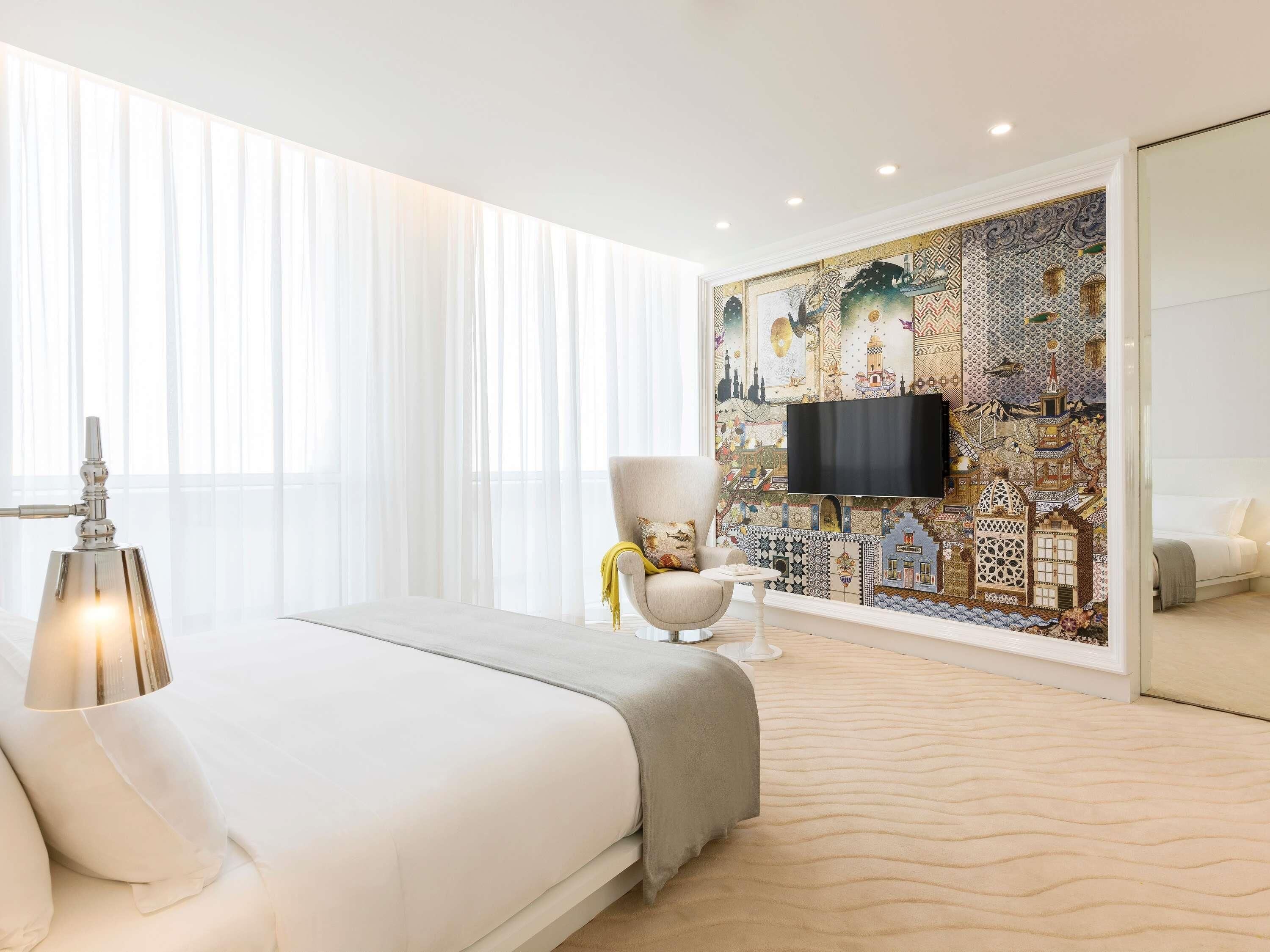 Premium bedding, down comforters, minibar, in-room safe