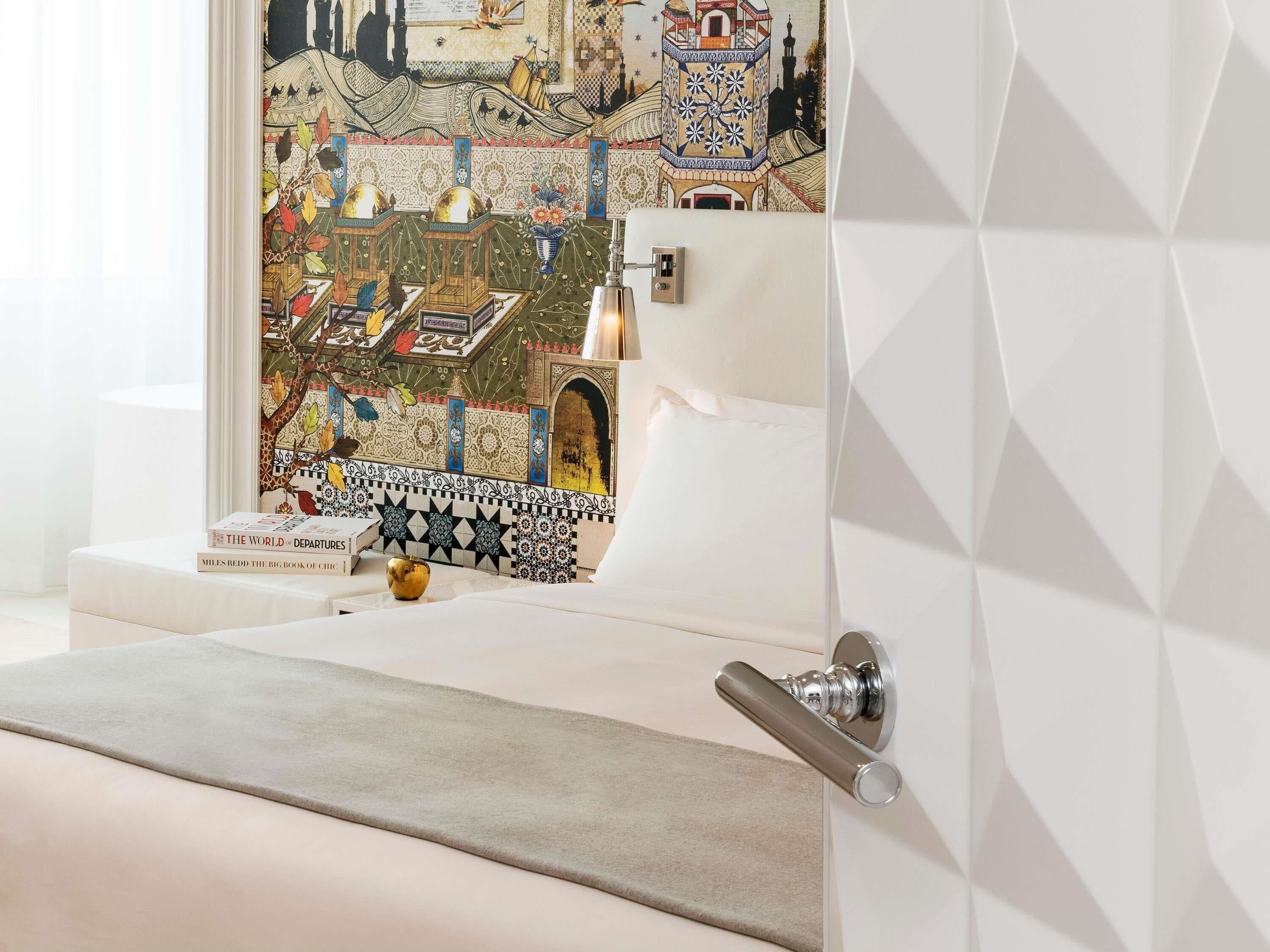 Premium bedding, down comforters, minibar, in-room safe