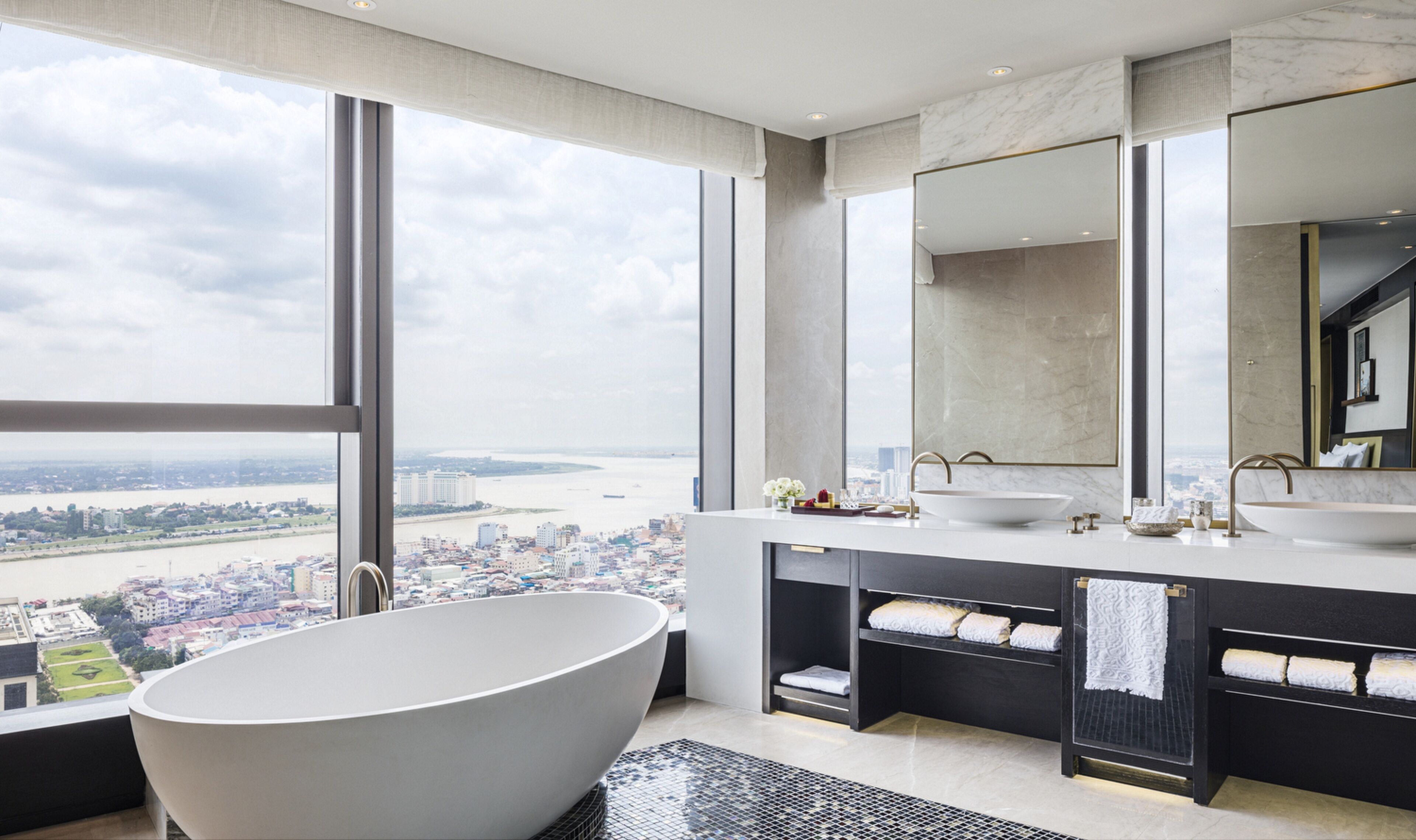 separate bathtub and shower, deep-soaking bathtub, designer toiletries