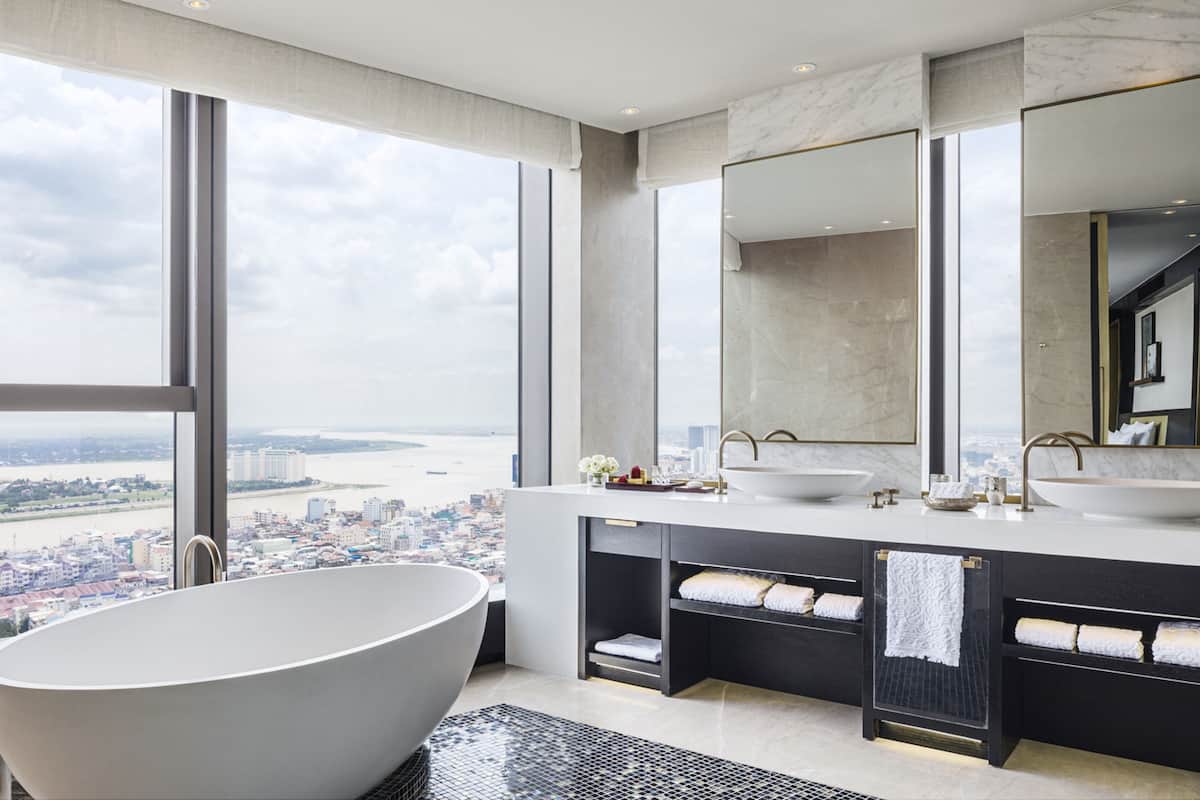 separate bathtub and shower, deep-soaking bathtub, designer toiletries