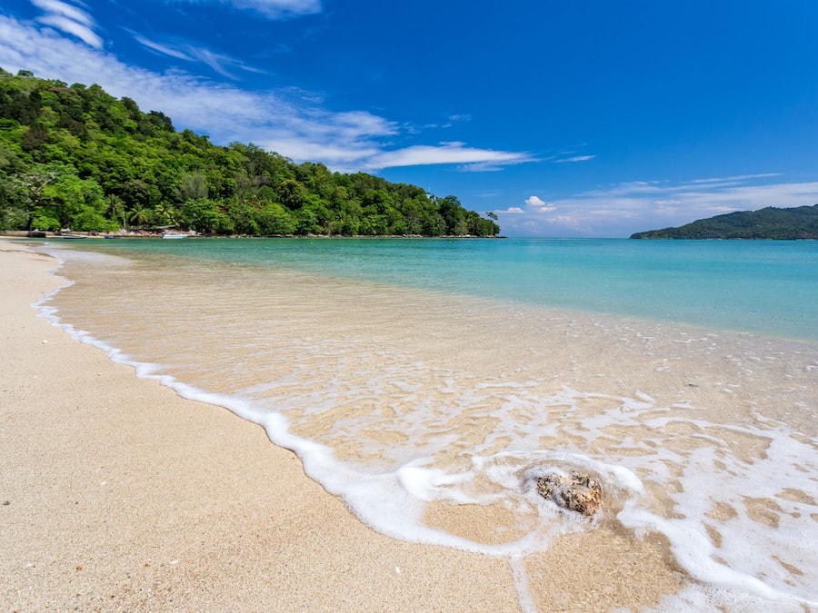 On the beach, white sand, kayaking