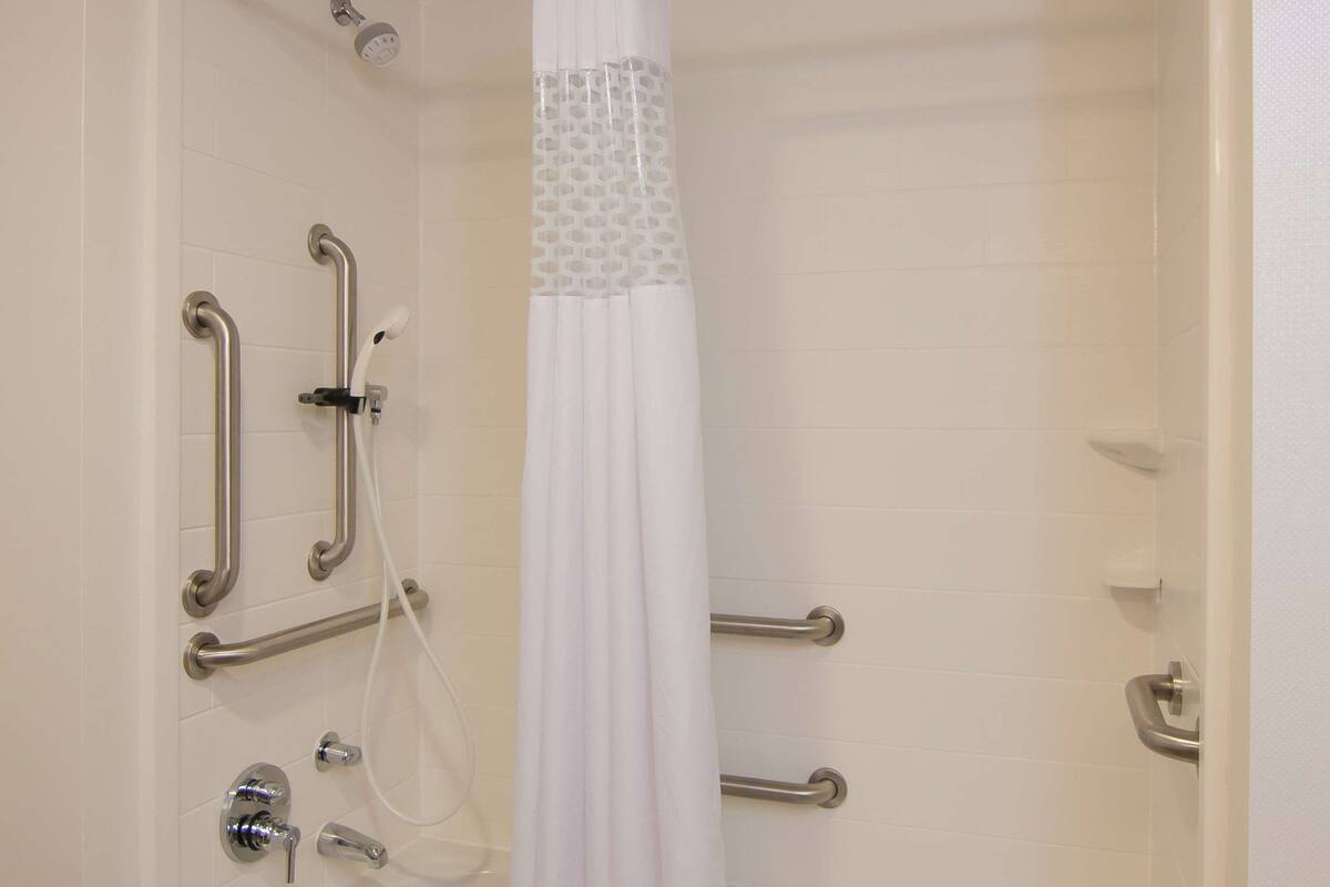 shower, free toiletries, hair dryer, towels