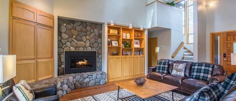 Family Apartment, 5 Bedrooms | Living area | TV, fireplace, DVD player, table tennis