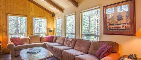 Family Apartment, 4 Bedrooms | Living area | TV, fireplace, video game console, DVD player