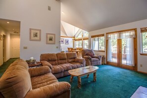 Family Apartment, 3 Bedrooms | Living area | TV, fireplace, video game console, DVD player