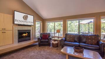 Family Apartment, 4 Bedrooms | Living area | Flat-screen TV, DVD player