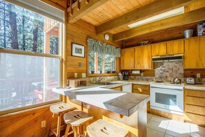 Family Apartment, 4 Bedrooms | Private kitchen | Fridge, microwave, coffee/tea maker