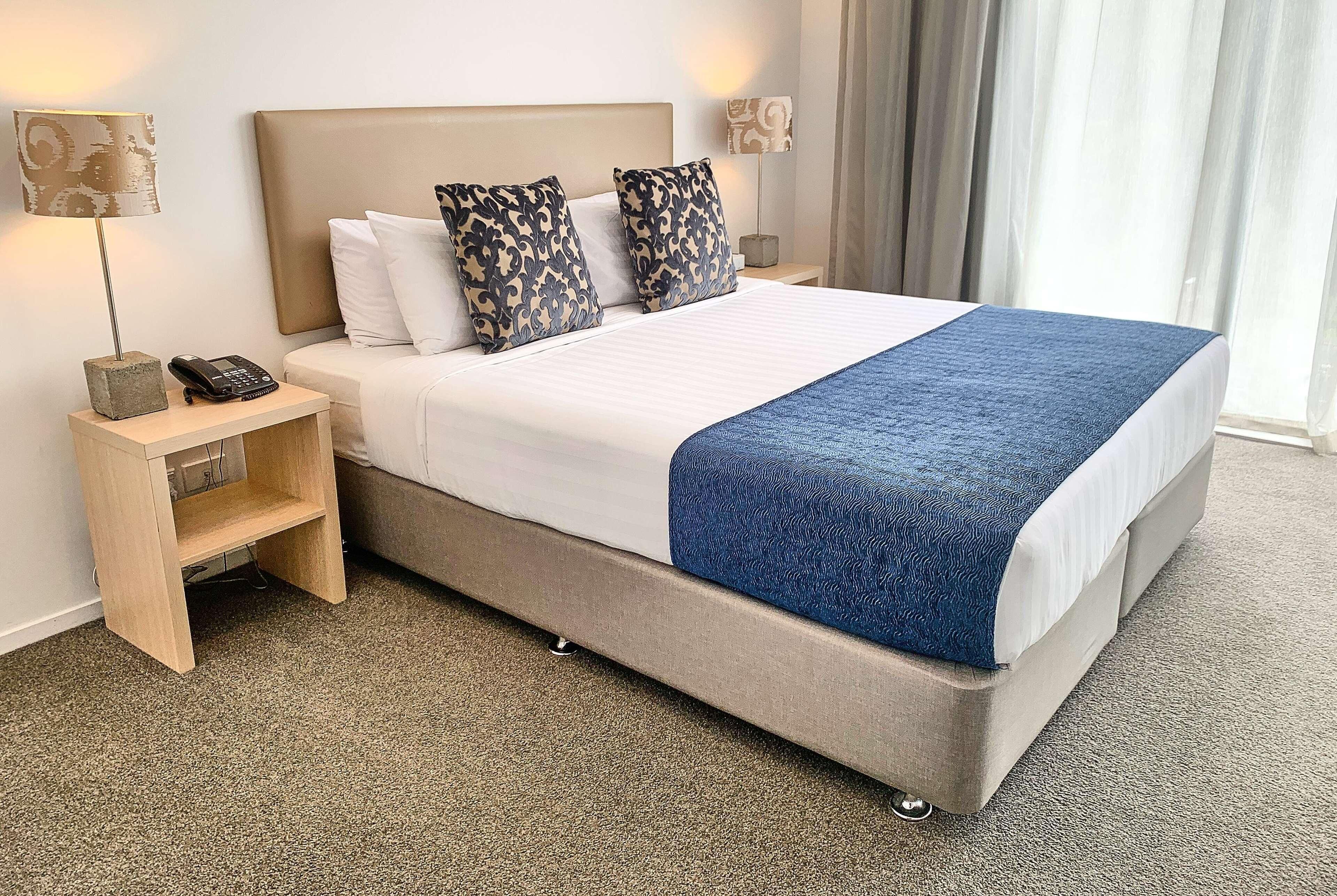 Premium bedding, laptop workspace, iron/ironing board, cots/infant beds