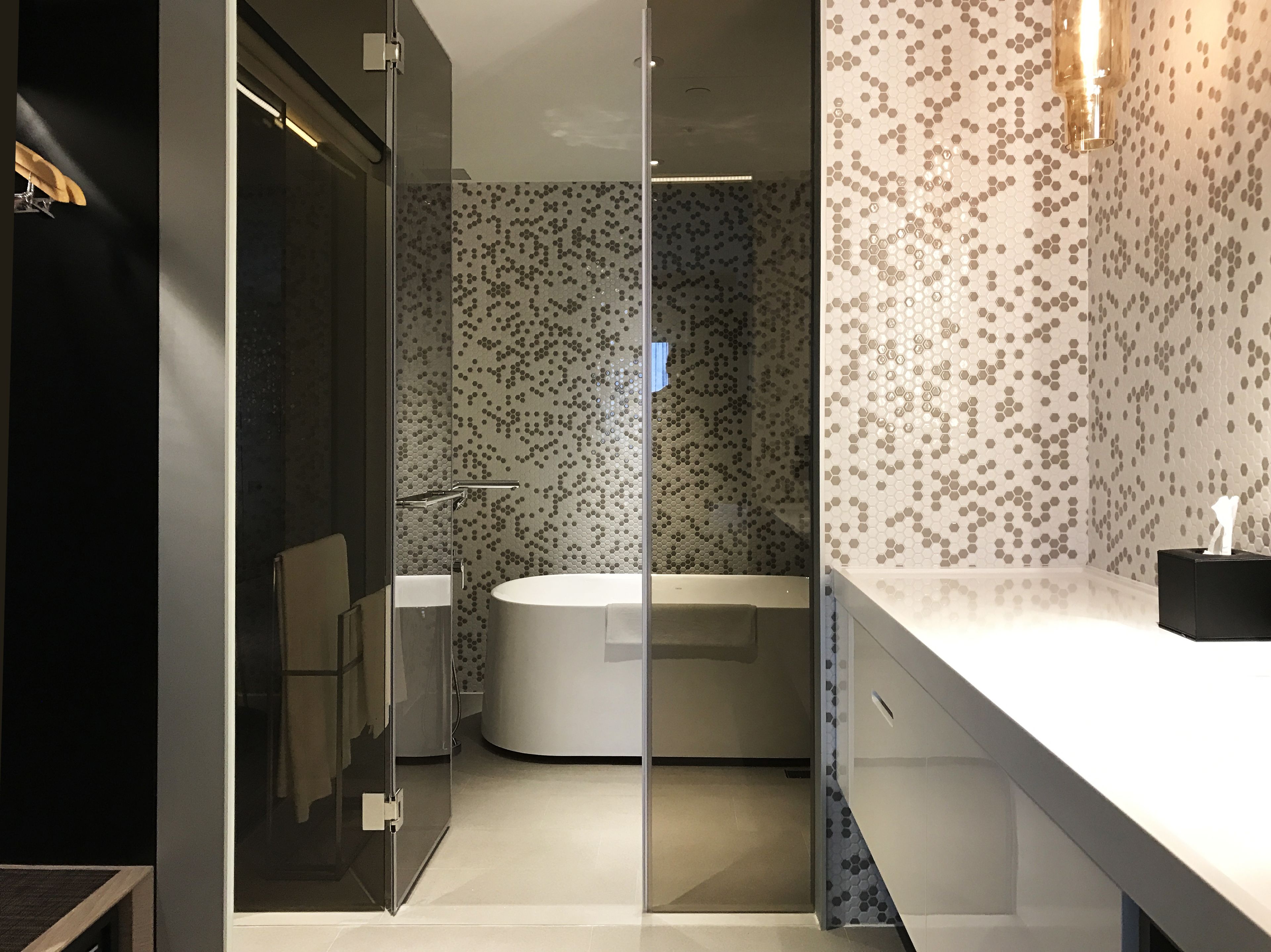 executive suite | bathroom | hair dryer, slippers, towels, soap