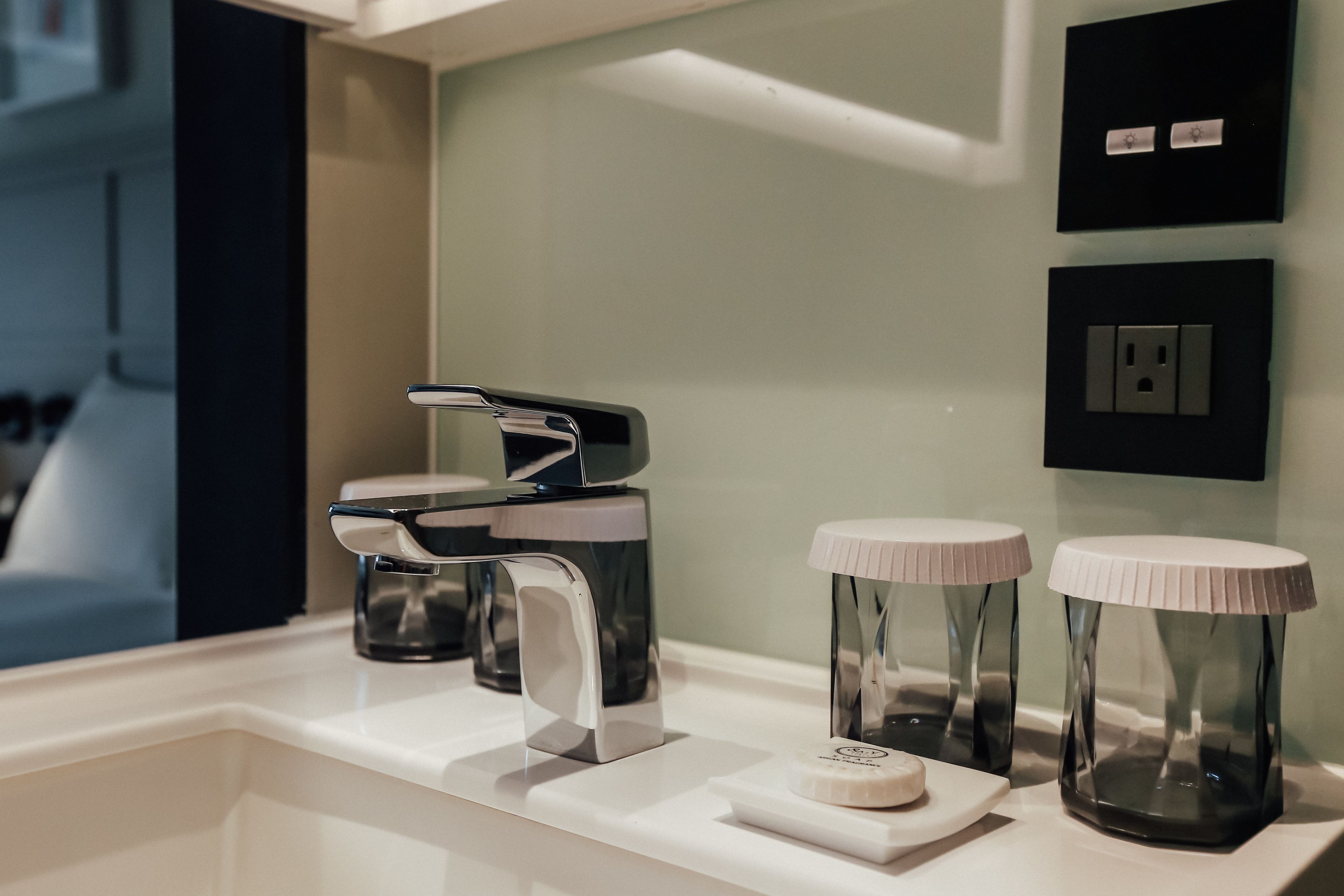 hair dryer, slippers, towels, soap