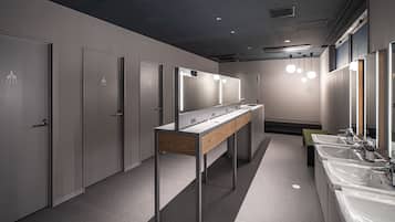 Hair dryer, slippers, towels, soap