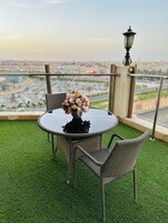 Executive Suite, 1 King Bed, Balcony | Terrace/patio