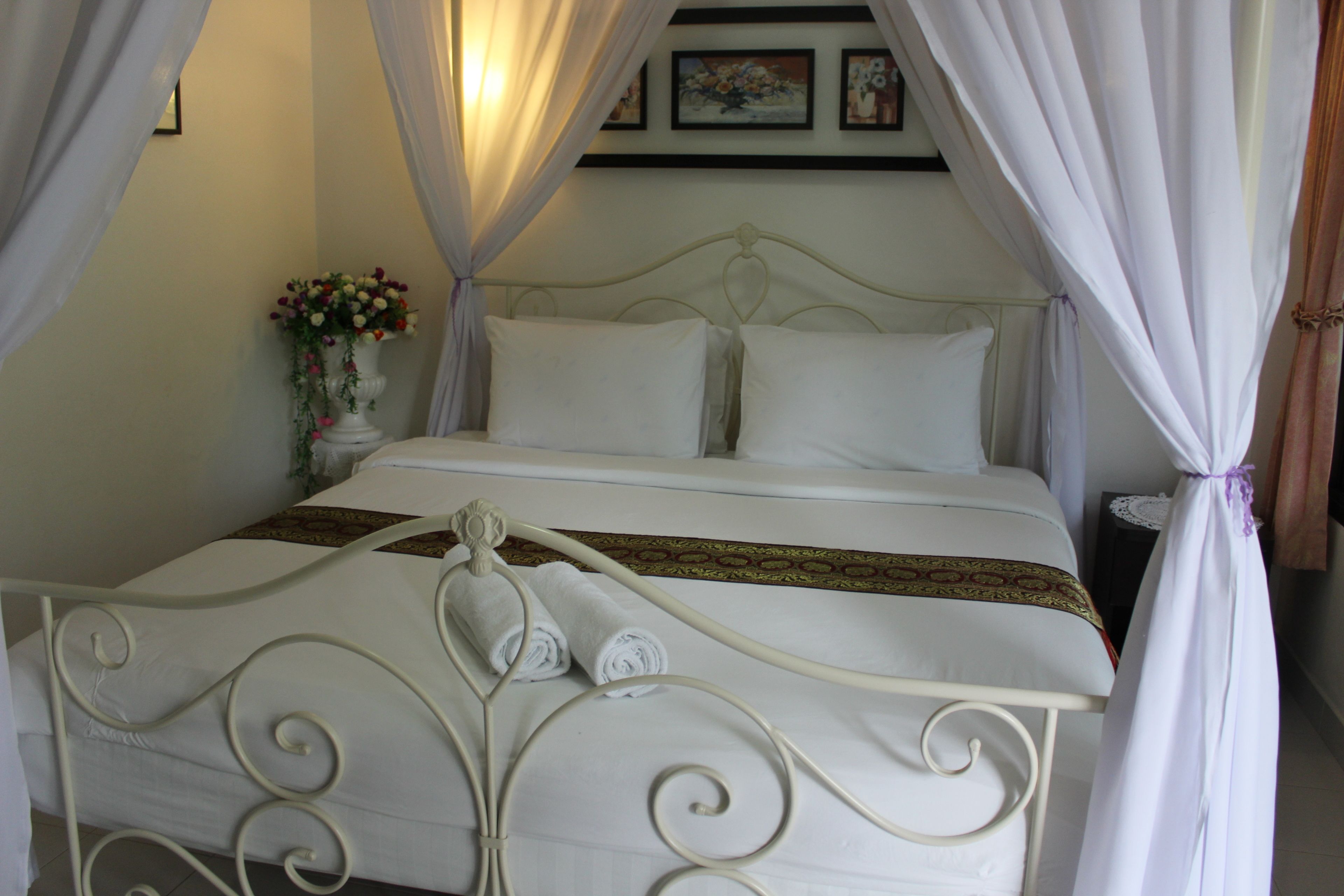 family room, 1 king bed with sofa bed, garden view, garden area | 1 bedroom, premium bedding, free minibar, individually decorated