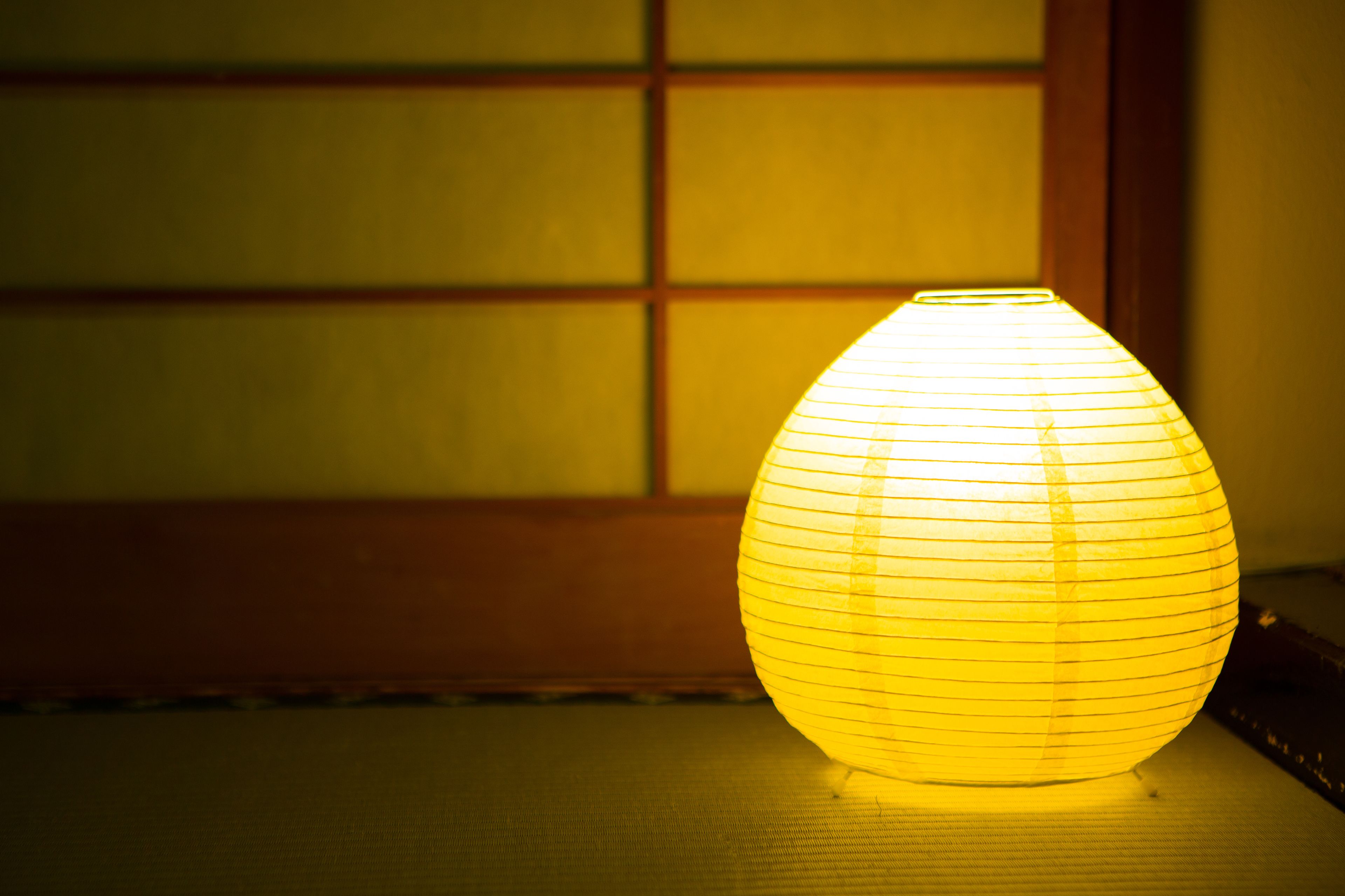 A traditional paper lantern on a table.
