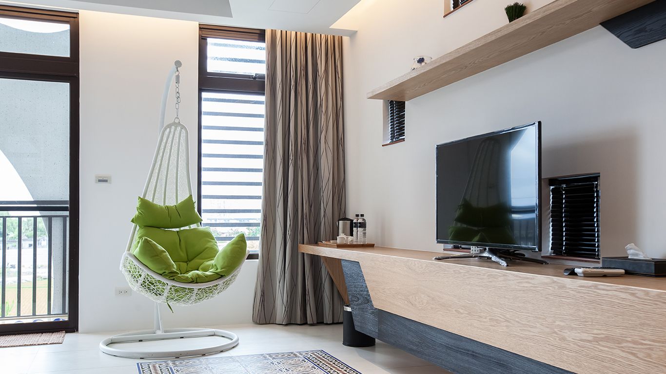 Deluxe Double Room, 1 Queen Bed | Living area | LCD TV