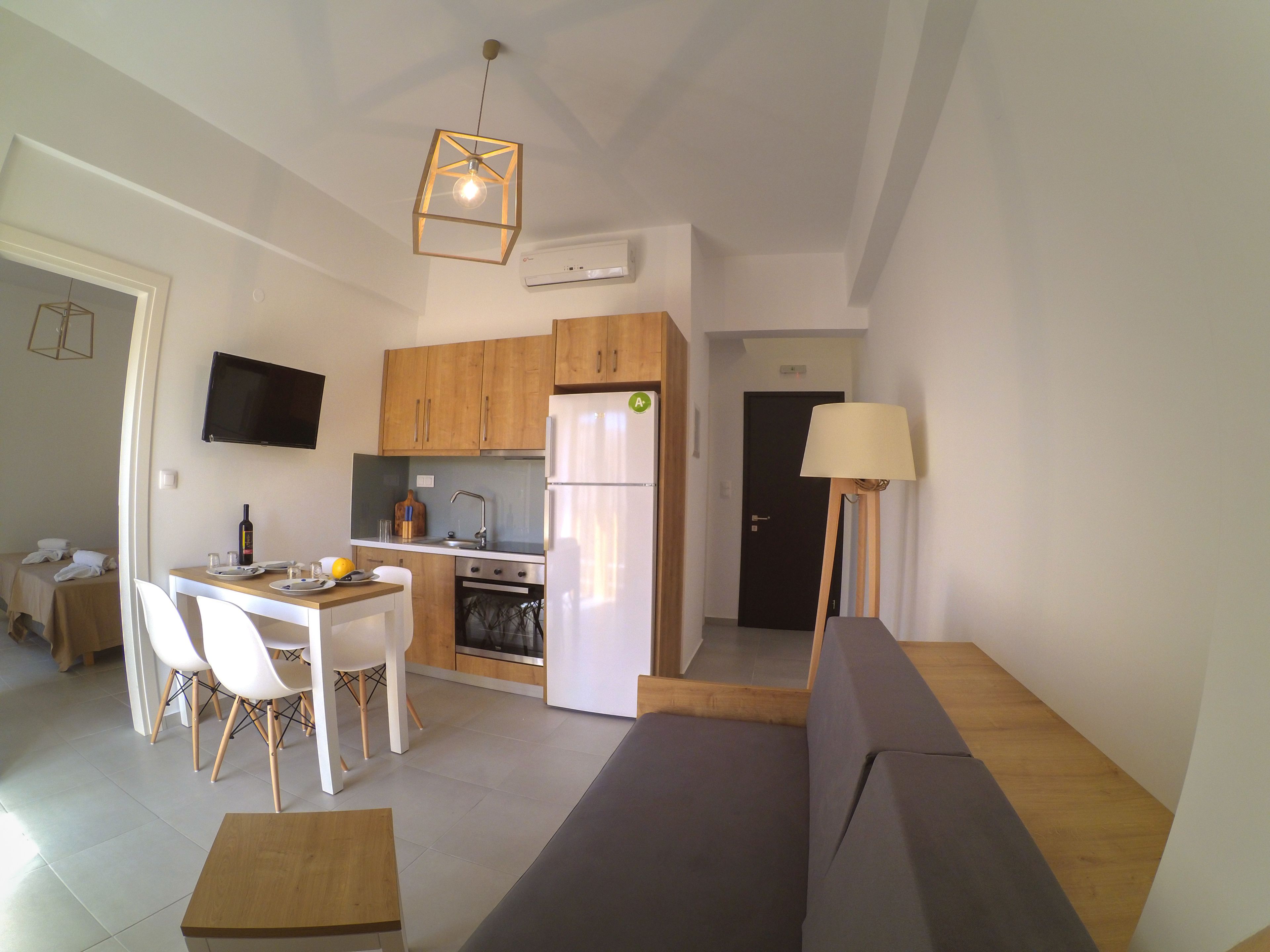 Superior Apartment, 1 Bedroom, Sea View | Private kitchen | Coffee/tea maker, electric kettle, highchair, cleaning supplies
