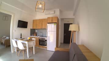 Superior Apartment, 1 Bedroom, Sea View | Private kitchen | Coffee/tea maker, electric kettle, highchair, cleaning supplies