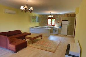 Villa, alberca privada | Área de sala de estar